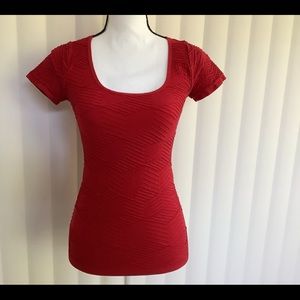 Red scooped neck top
